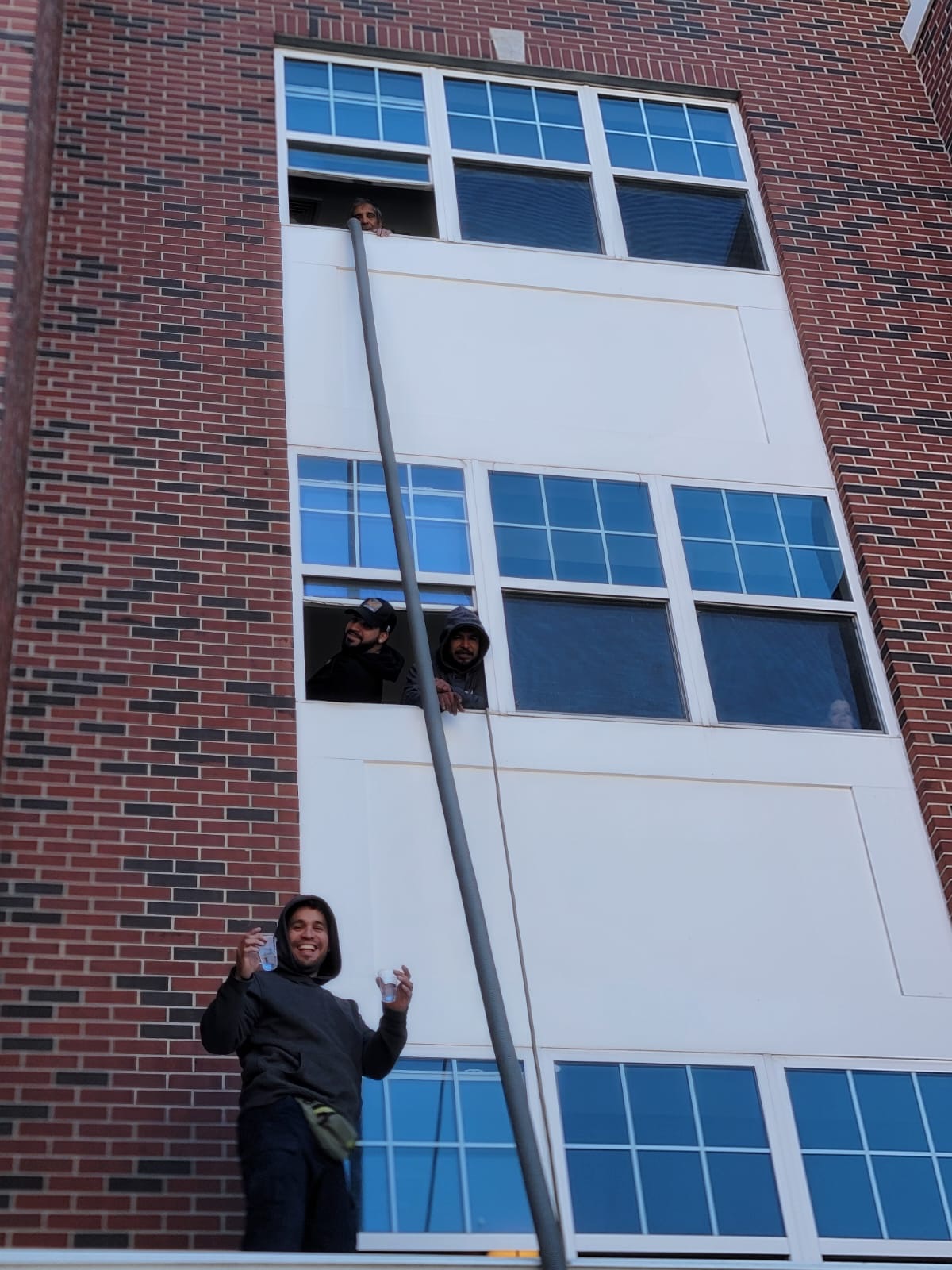 Cleanomatic Team outside Building