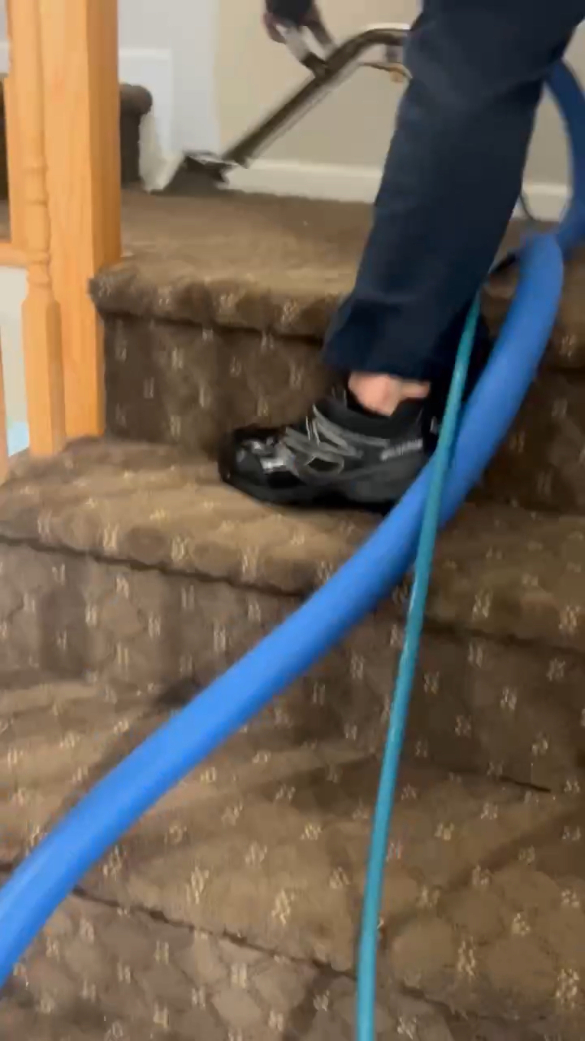 David cleaning a couch