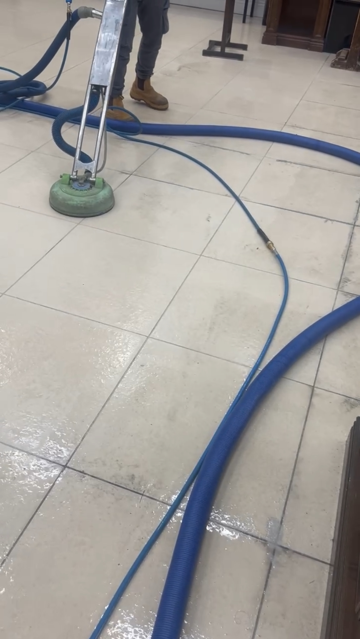 David cleaning a couch